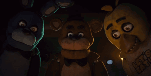 Five Nights At Freddy 'S Characters Are Standing Next To Each Other In The Dark GIF