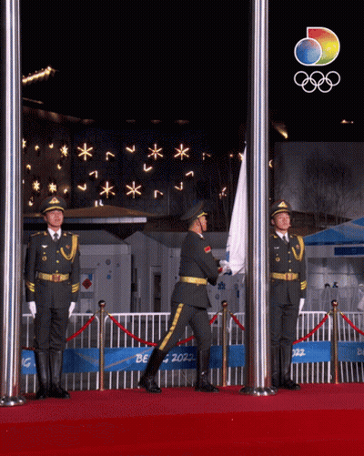 Flag Lowered In Front Of Beijing 2022 Sign GIF