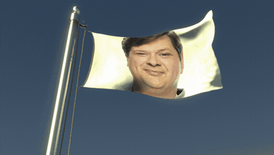 Flag With Man's Face Flying GIF