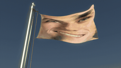 Flag With Man's Face Waving In Wind GIF