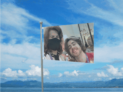 Flag With Two People Wearing Face Masks GIF