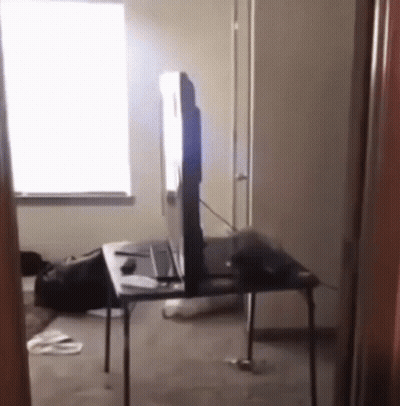 Flat Screen TV On Small Table GIF