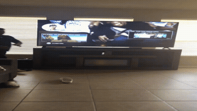 Flat Screen TV On Stand GIF