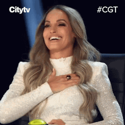 Flattered Trish Stratus GIF