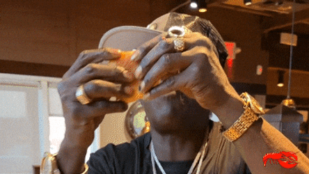 Flavor Flav Enjoying His Food GIF