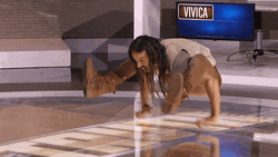 Flexible Man Hang His Legs On Her Arms GIF