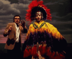 Flight Of The Conchords Feather Costume GIF