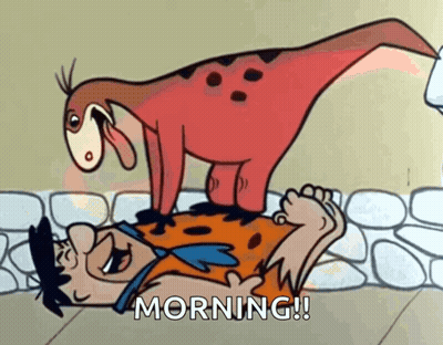 Flintstone Lying On Ground With Dinosaur On Top GIF