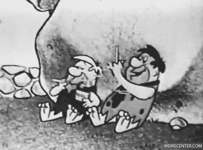 Flintstones Smoking Cigarette Holding Gun GIF