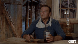 Flip Table John Wayne GIF