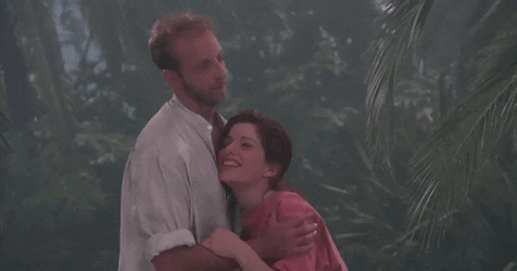 Flirty Couple In Forest GIF