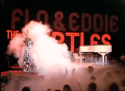 Flo And Eddie Turtles Playing Piano On Stage GIF