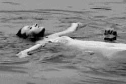 Floating Lady Gets Hug From Behind GIF