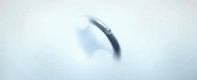 Floating Ring In Front Of Mountain GIF