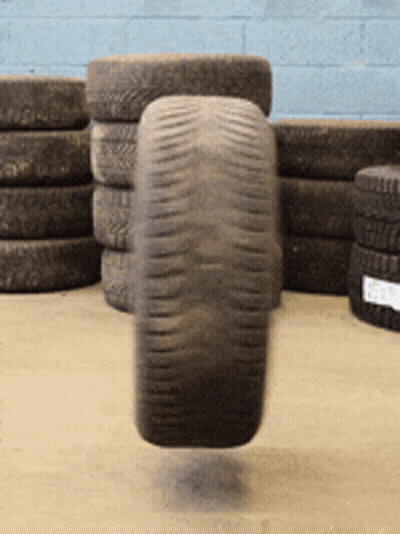 Floating Tire Near Pile GIF