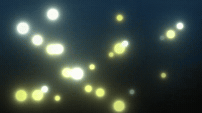Floating Yellow Lights In Dark GIF