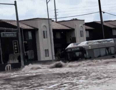 Flooded Street Outside New Holland Building GIF