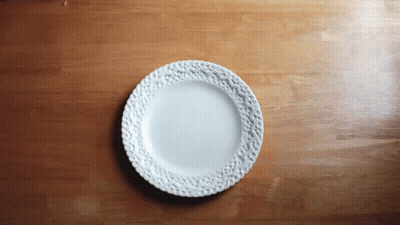 Floral White Plate On Wooden Table GIF
