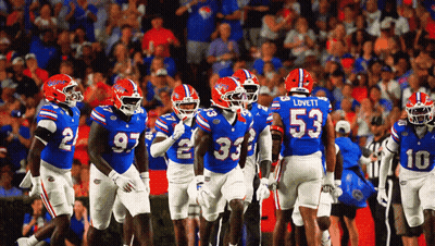 Florida Football Players Including Lovett And Number 53 GIF