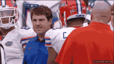 Florida Football Players Talking To Coach GIF