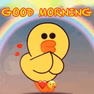 Fluffy Kitten Sitting Next To Cup Of Coffee GIF
