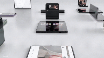 Folding Phones With Woman On Screen GIF