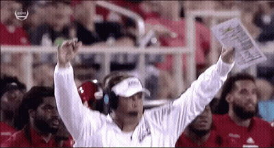 Football Coach Holding Paper With Visor GIF