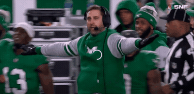 Football Coach In Headphones And Green Jacket GIF