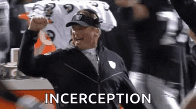 Football Coach Raising Fist With Crowd Cheering GIF