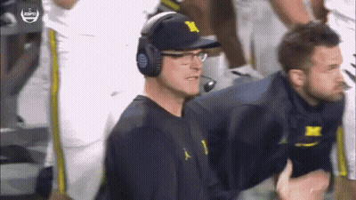 Football Coach With Headphones And M Hat GIF