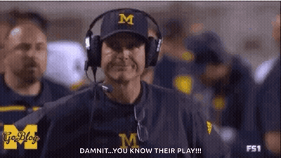 Football Coach With Headphones Talking To Players GIF