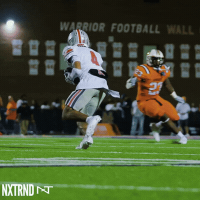 Football Game At Warrior Football Wall GIF