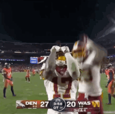 Football Game Between Den And Washington GIF