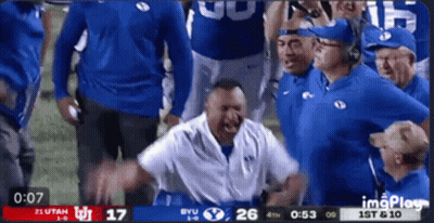 Football Game Between Utah And BYU On Screen GIF