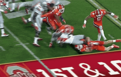 Football Game In Front Of 1St & 10 Banner GIF
