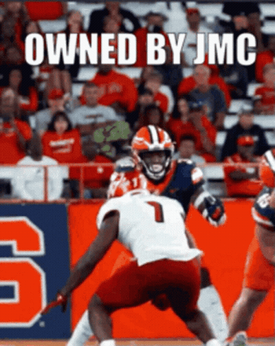Football Game In Front Of Crowd With Owned By JMC Sign GIF