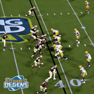 Football Game In Front Of Dynasty Degens Sign GIF