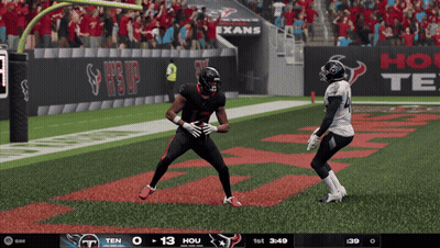 Football Game In Front Of Exans Banner GIF