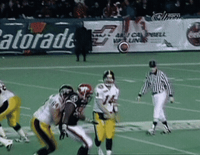 Football Game In Front Of Gatorade Banner GIF