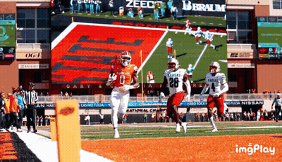 Football Game In Front Of Imgplay Screen GIF