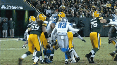 Football Game In Front Of State Farm Sign GIF