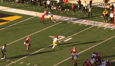 Football Game In Front Of Texas A & M Banner GIF