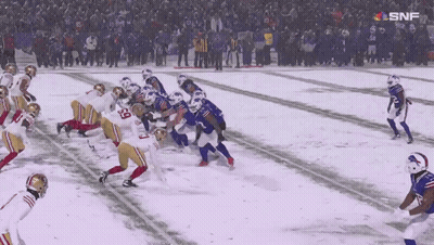 Football Game In Snow With SNF Logo GIF
