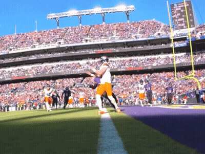 Football Game In Stadium With Reebok Scoreboard GIF