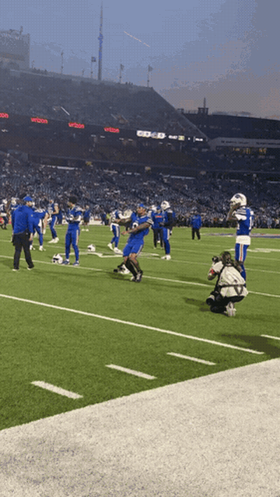 Football Game In Stadium With Verizon Sign GIF