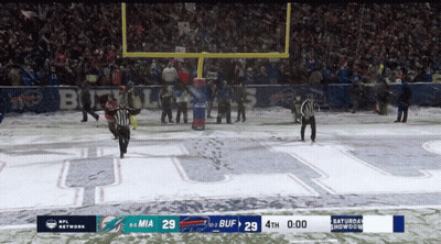 Football Game On Snowy Field GIF