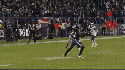 Football Game Underway With Lamar Banner GIF