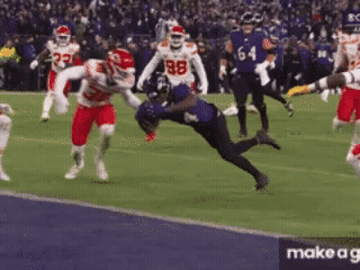 Football Game With Players In Red And White Uniforms GIF