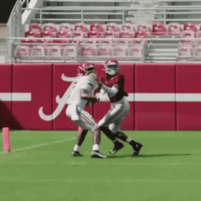 Football Player 49 With Man In Red Shirt GIF