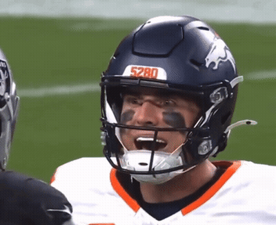 Football Player 5280 Helmet Talking To Another Player GIF
